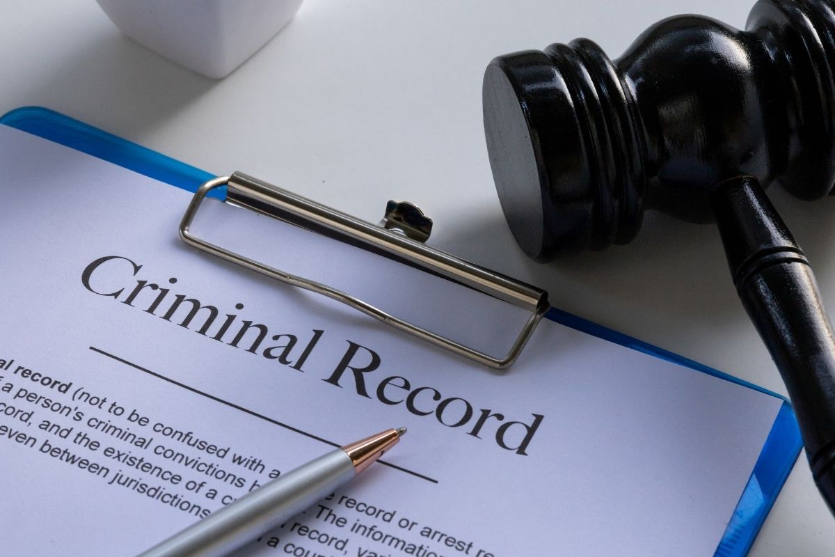 criminal record papers with a gavel