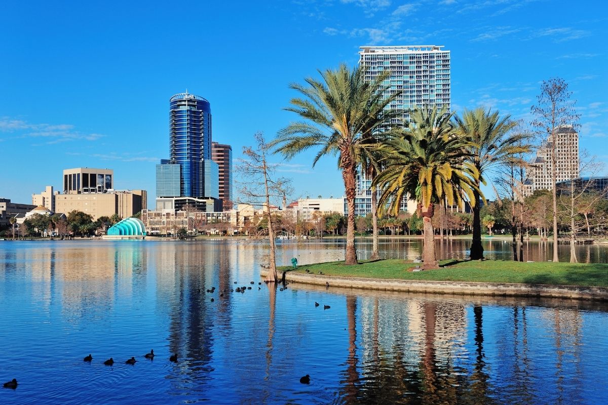 Orlando, FL city view with water and palm trees