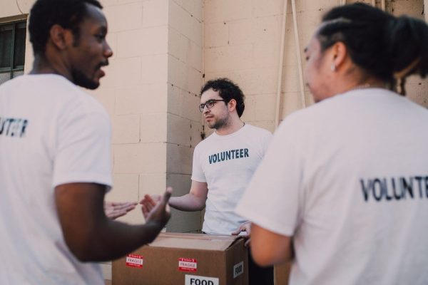 a group of three male volunteers